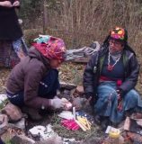 Nana Maria building the ceremonial fire to welcome the new era in 2012.